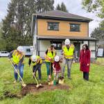 Carnation City Council members prepare to break ground on the site of the new city campus, with the help of Deputy Mayor Jessica Merizans daughter Aurora, April 28, 2026. From left: Cheryl Paquette; Jim Ribail; Jessica Merizan; Aurora; Max Voelker; City Manager Rhonda Ender. (Grace Gorenflo/Valley Record)