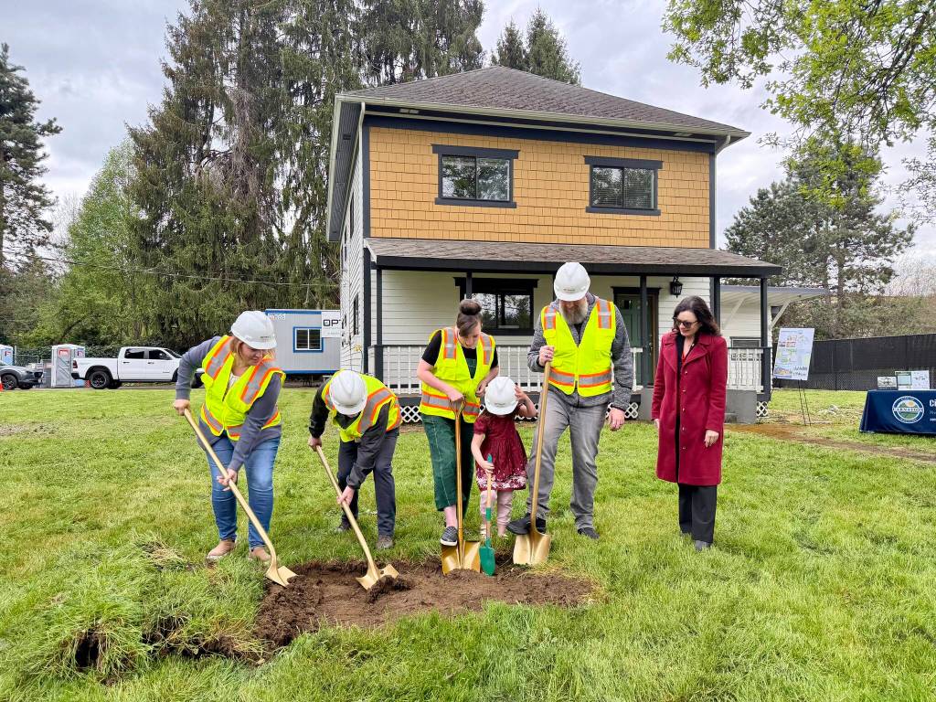 Carnation City Council members prepare to break ground on the site of the new city campus, with the help of Deputy Mayor Jessica Merizans daughter Aurora, April 28, 2026. From left: Cheryl Paquette; Jim Ribail; Jessica Merizan; Aurora; Max Voelker; City Manager Rhonda Ender. (Grace Gorenflo/Valley Record)
