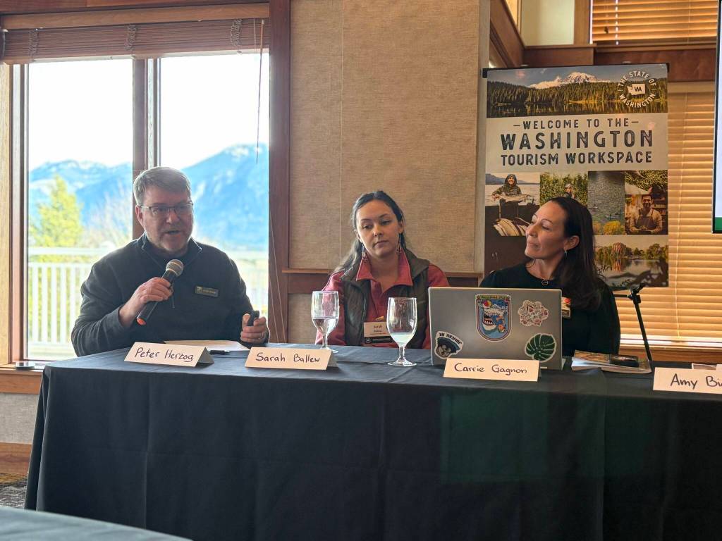 Peter Herzog, Sarah Ballew, and Carrie Lee Gagnon speaking at a recent gathering for the Chamber of Commerce. Photo by Kelly Coughlin and Renee Price