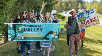 Board members of Snoqualmie Valley for Responsible Energy lead the march to Fisher Creek Park, April 26, 2026. Photo courtesy of Whitney Schrader