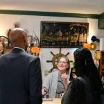 King County Executive Girmay Zahilay (left) talks with Susan Garbe, owner of Lucky Duck Thrift Shoppe, May 5, 2026. (Grace Gorenflo/Valley Record)