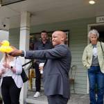 King County Executive Girmay Zahilay stands for a photo with a rubber duck from Lucky Duck Thrift Shoppe in Fall City, May 5, 2026. (Grace Gorenflo/Valley Record)