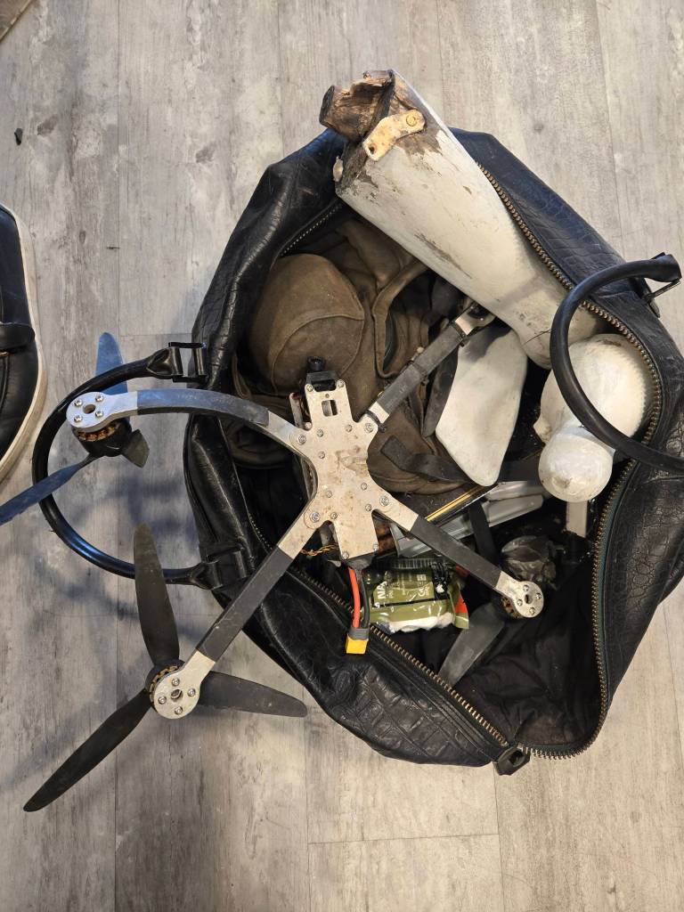 A bag of items from the front lines of the Ukraine War, including a Russian drone. Photo by Keelin Everly-Lang / the Mirror.