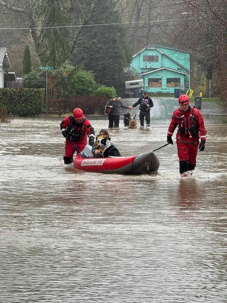 Snoqualmie firefighters rescue residents after their home flooded, Dec. 10, 2025. Photo courtesy of the city of Snoqualmie