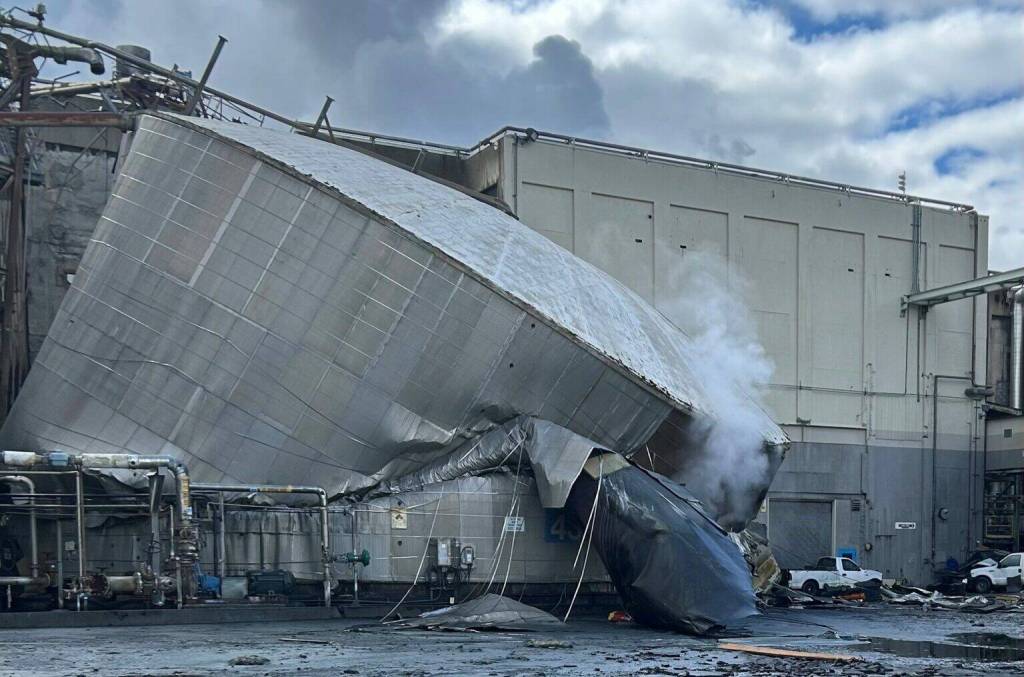 The burst white liquor tank is seen at the Nippon Dynawave Packaging facility in Longview, Washington, on May 26, 2026. (Photo courtesy of Longview Fire Department)
