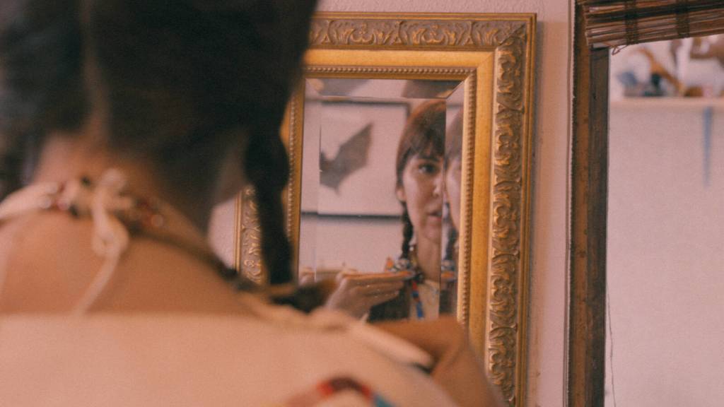 "Are You Native?" is a short documentary directed by Victoria Cheyenne (Aymara) and shows PNW local and Indigenous moccasin maker Shauna White Bear (Arikara), a former resident of Puyallup and Pierce County, as she traverses her grief and connects with her identity through her work and her self-recorded VHS tapes. Image courtesy of SIFF.