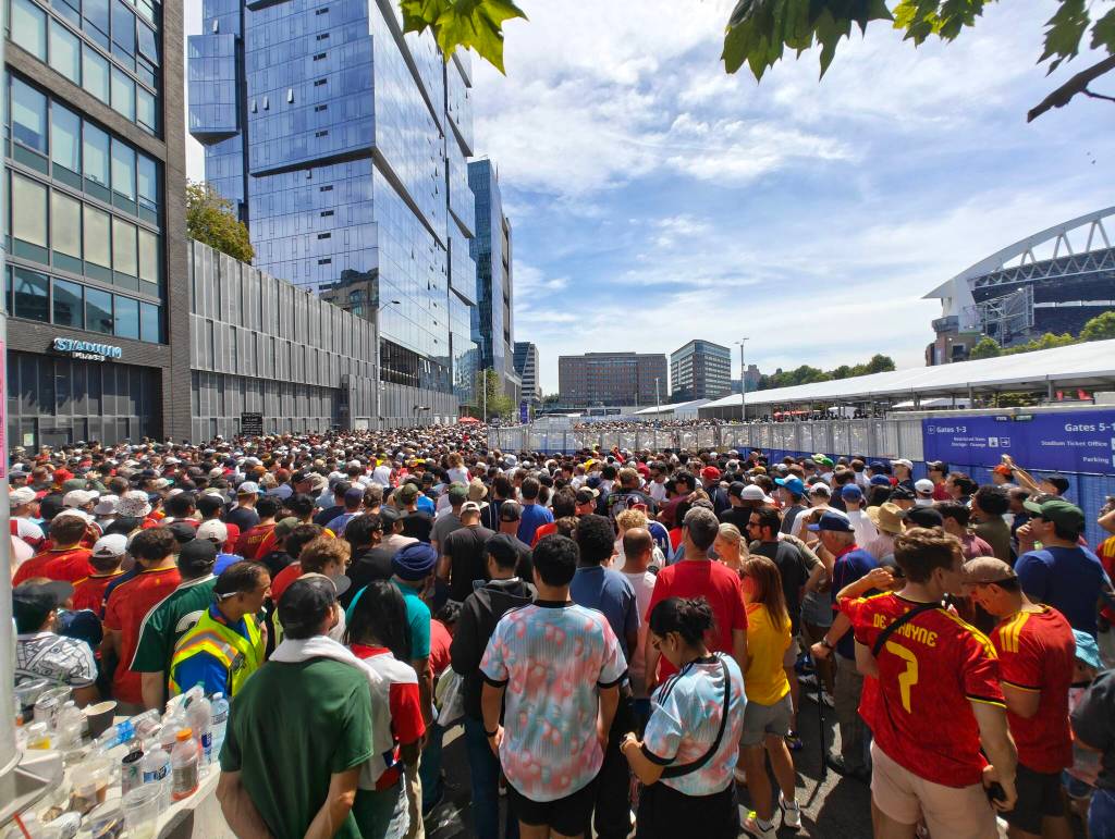 Fans flood to the gates to enter for the Belgium vs. Egypt match at Seattle Stadium.