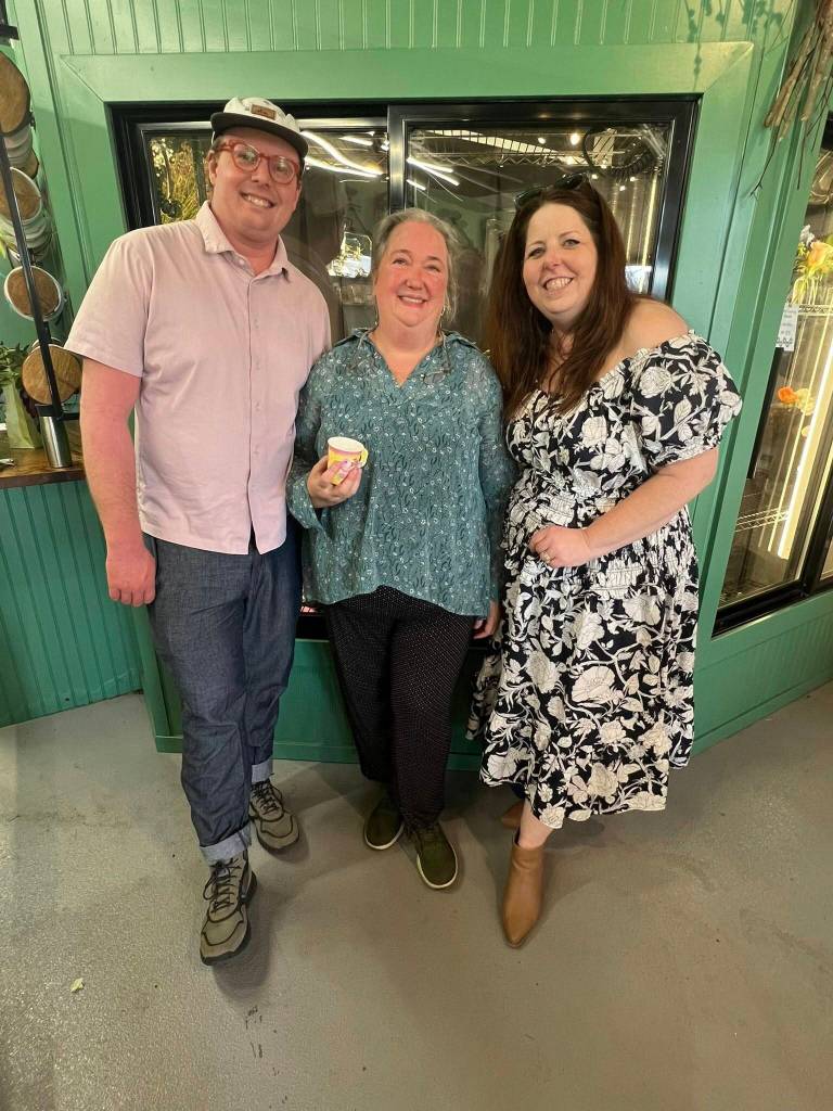 Down to Earth owners Max Pagel (left) and Sharlet Driggs (center) stand for a photo with Kelly Coughlin-Games, CEO of the SnoValley Chamber of Commerce. Photo courtesy of the SnoValley Chamber of Commerce