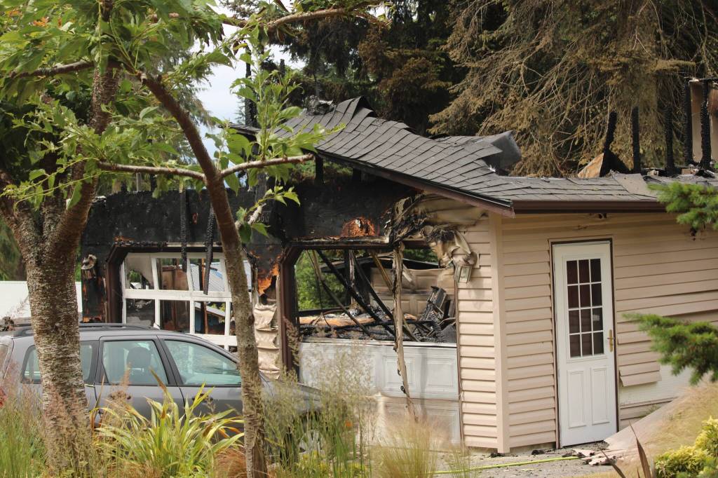 Photo by Allyson Ballard. Three homes were damaged by the fire and explosion.