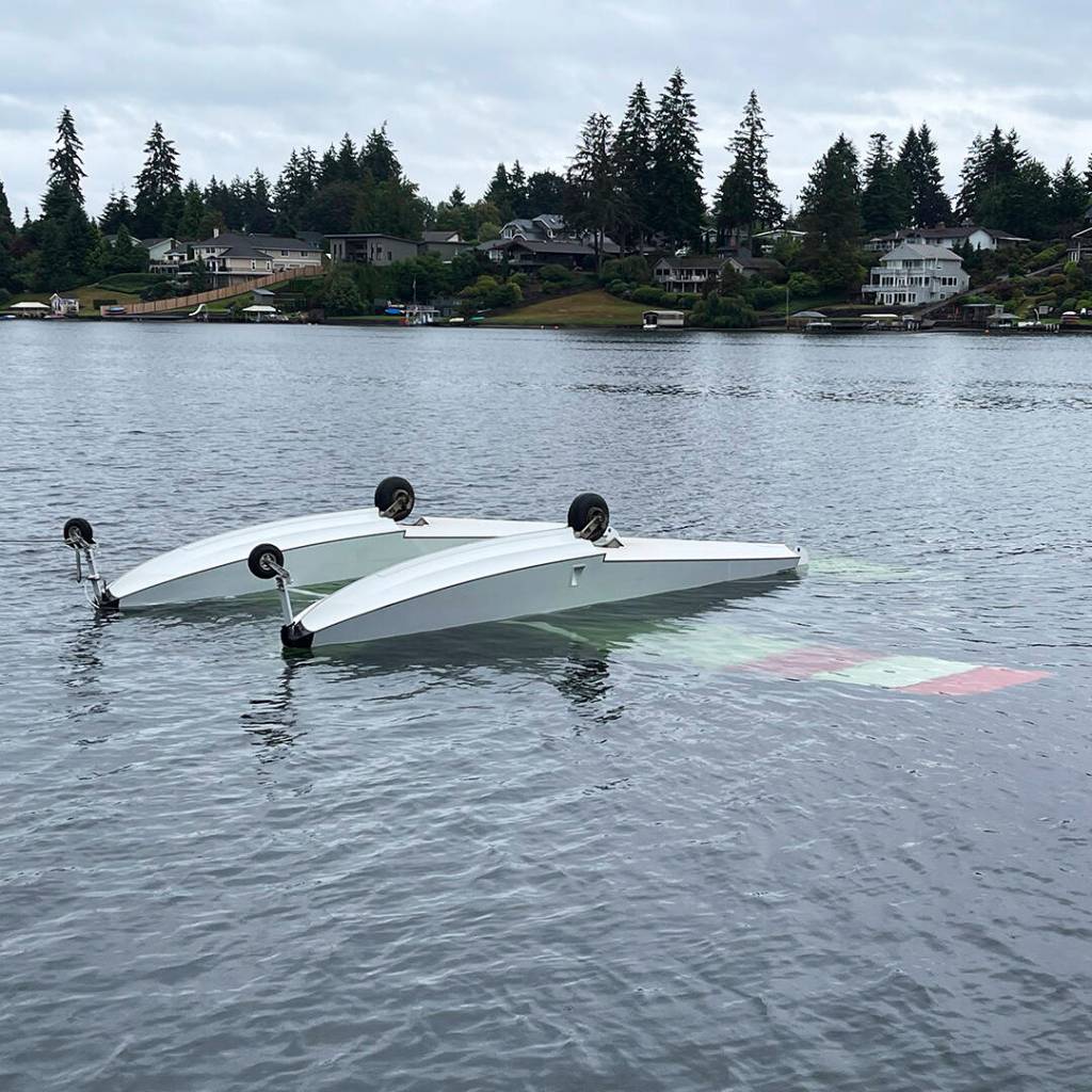 A seaplane floats upside down in Lake Meridian on Aug. 24, 2024. Residents and first responders rescued pilot Alan Williams from the submerged plane. COURTESY PHOTO, Puget Sound Fire